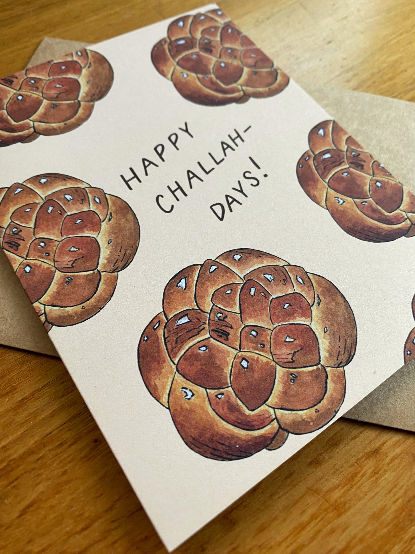 Greeting card with challah bread that says "Happy Challah-Days!"