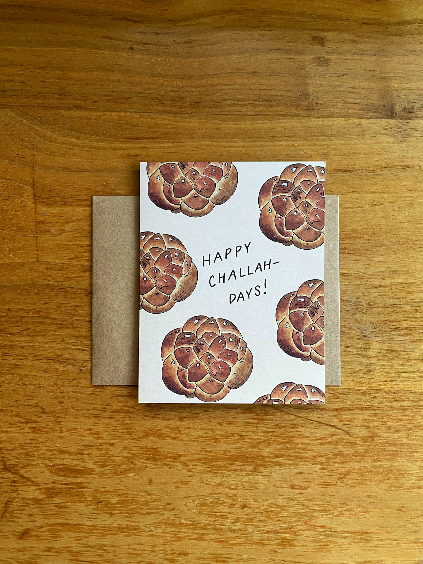 Greeting card with challah bread that says "Happy Challah-Days!"