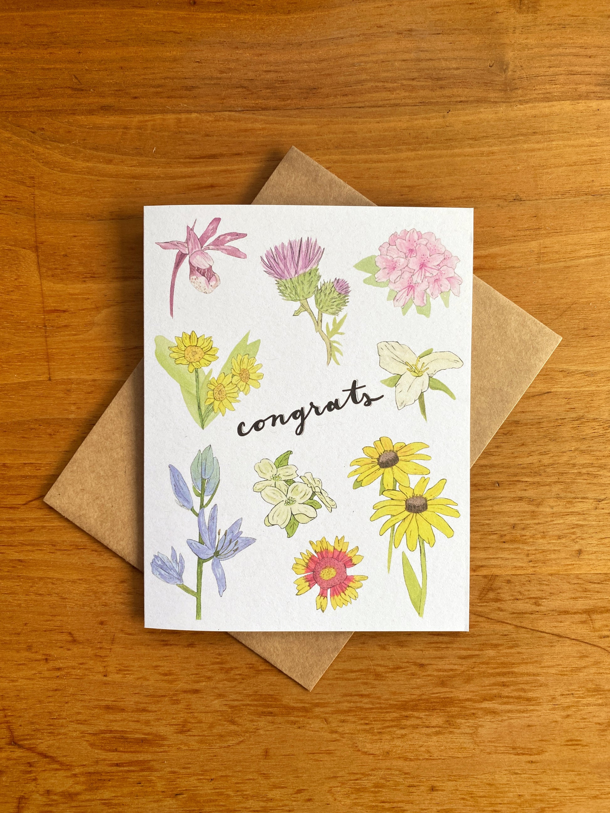 Watercolor wildflower greeting card that says "Congrats"