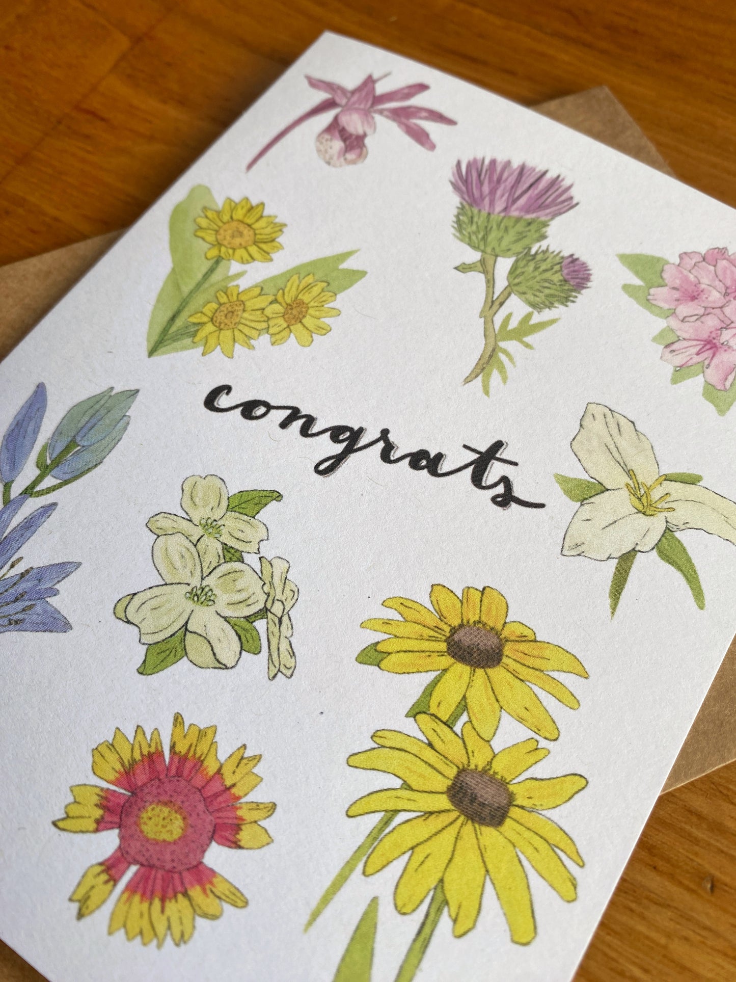 Watercolor wildflower greeting card that says "Congrats"