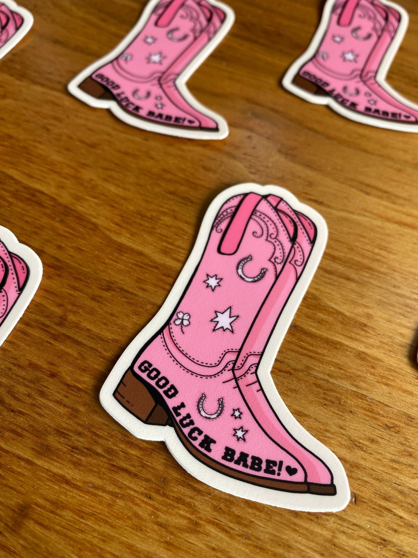 Chappell Roan fan art waterproof sticker of a pink cowboy boot that says "Good Luck Babe"