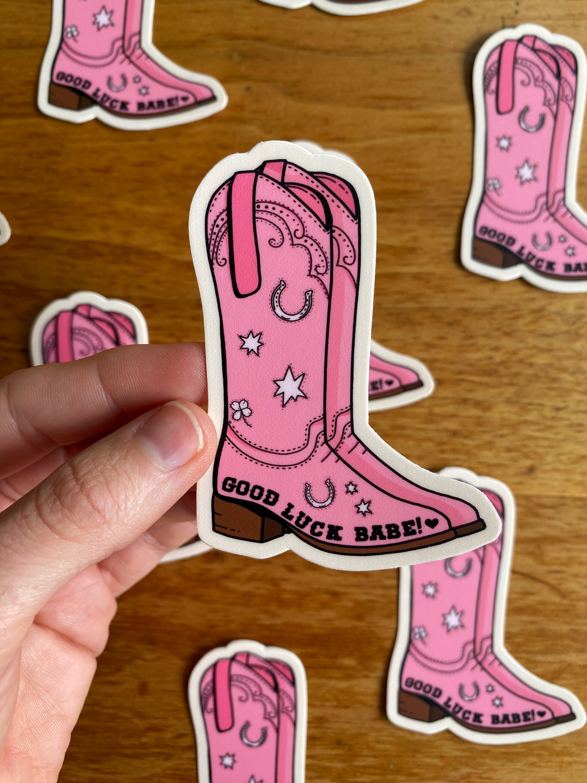 Chappell Roan fan art waterproof sticker of a pink cowboy boot that says "Good Luck Babe"