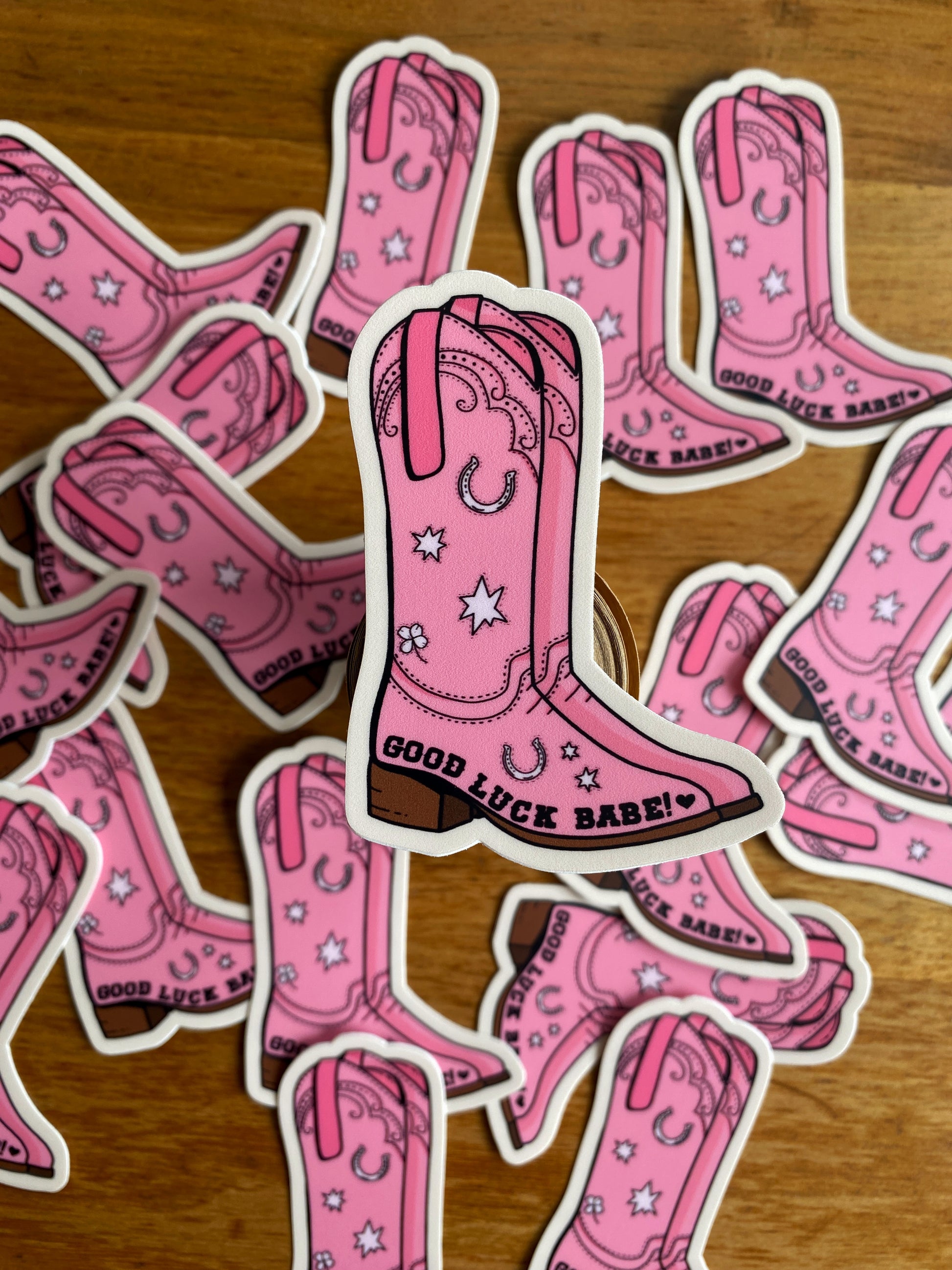 Chappell Roan fan art waterproof sticker of a pink cowboy boot that says "Good Luck Babe"