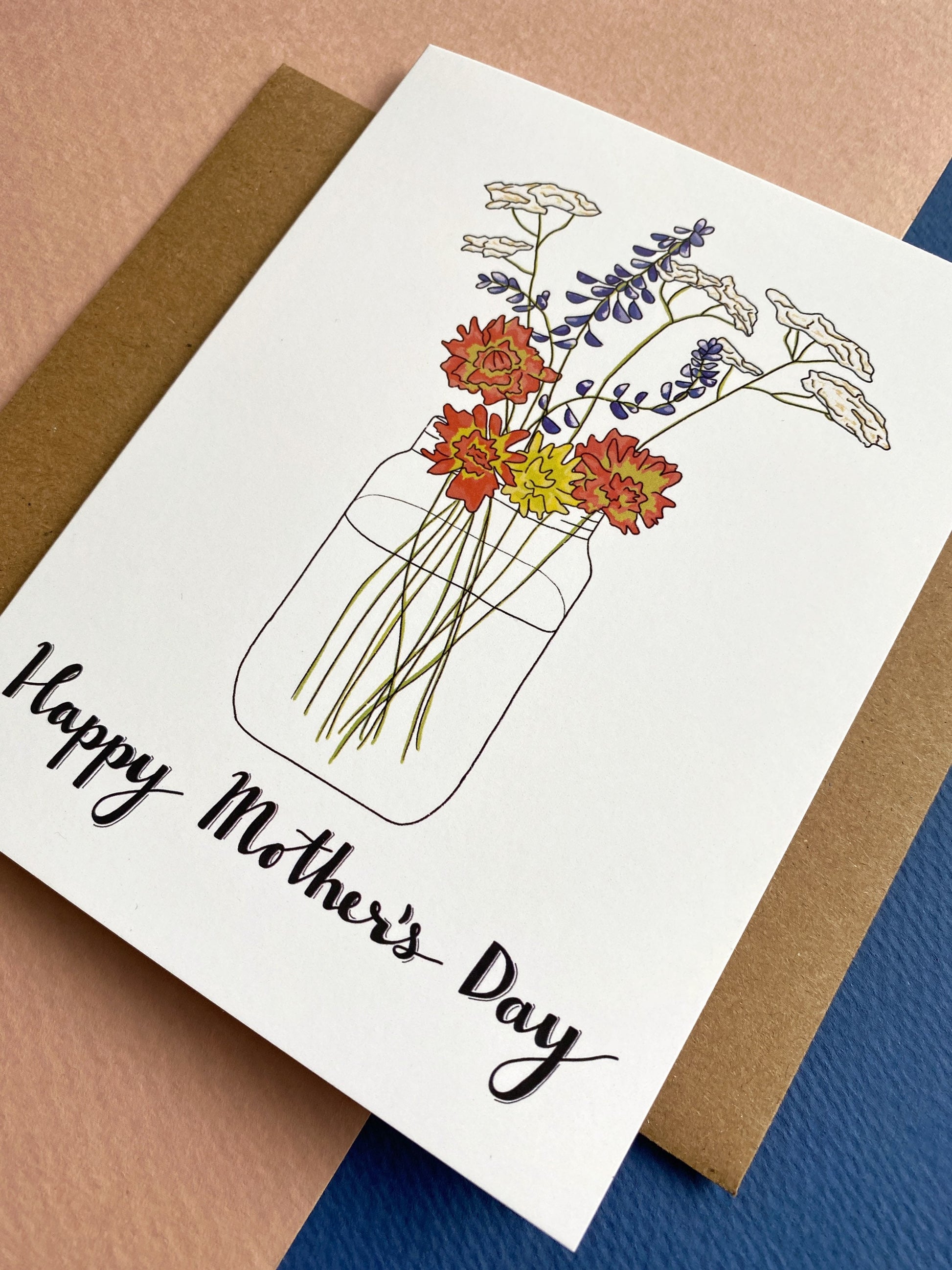 Greeting card with a wildflower bouquet in a mason jar and says "happy mother's day"