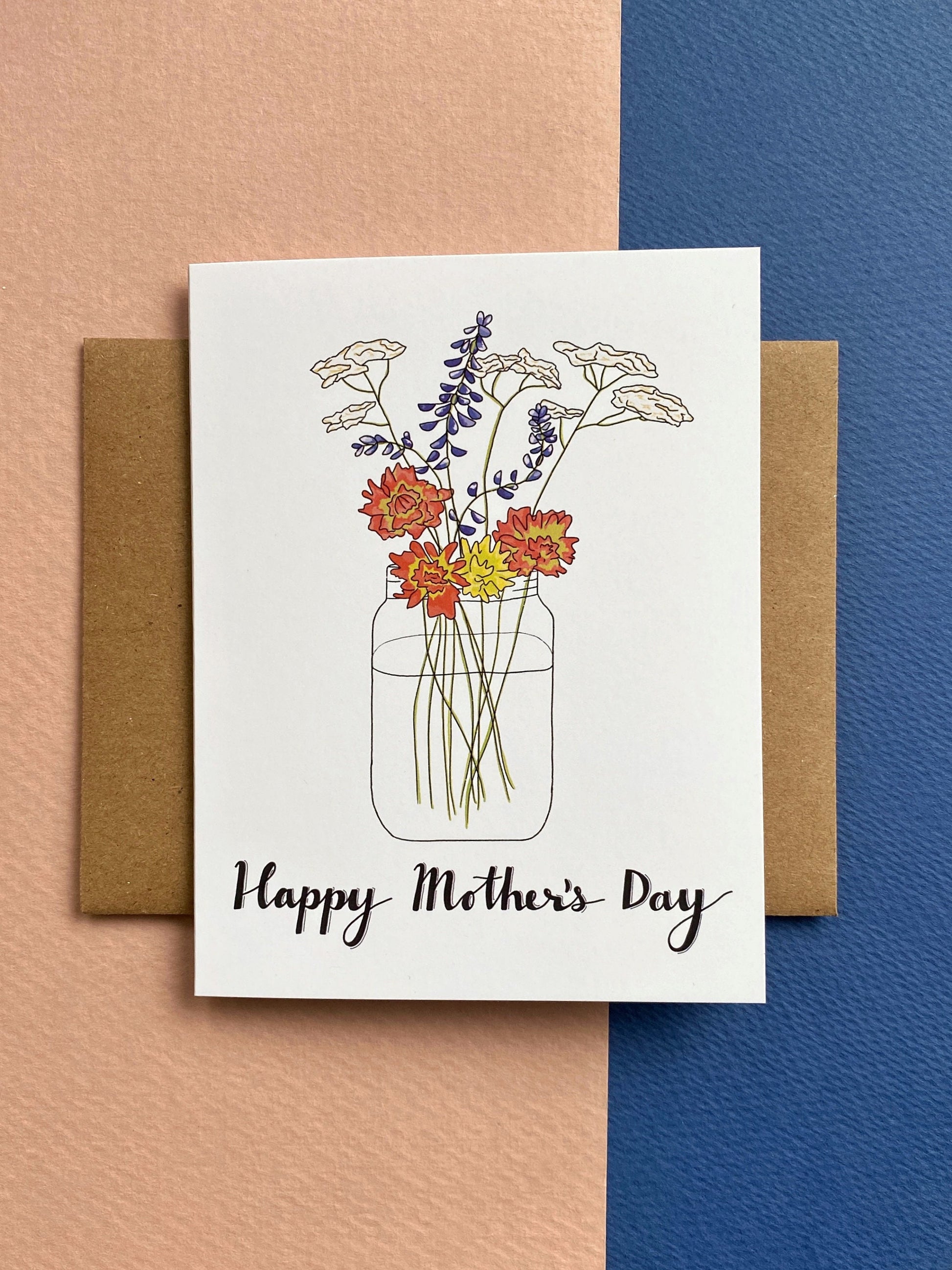 Greeting card with a wildflower bouquet in a mason jar and says "happy mother's day"