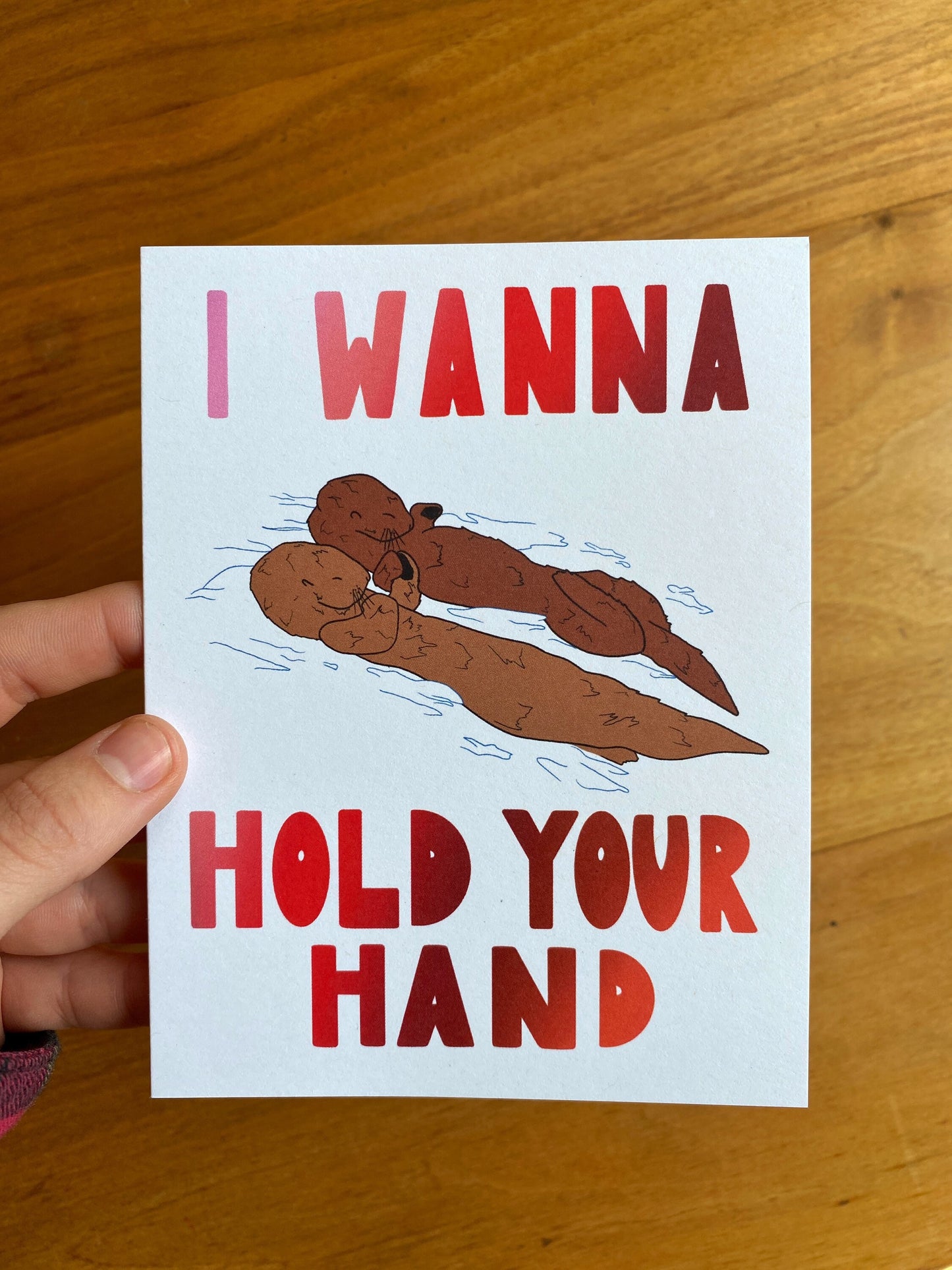 "I wanna hold your hand" otters holding hands card