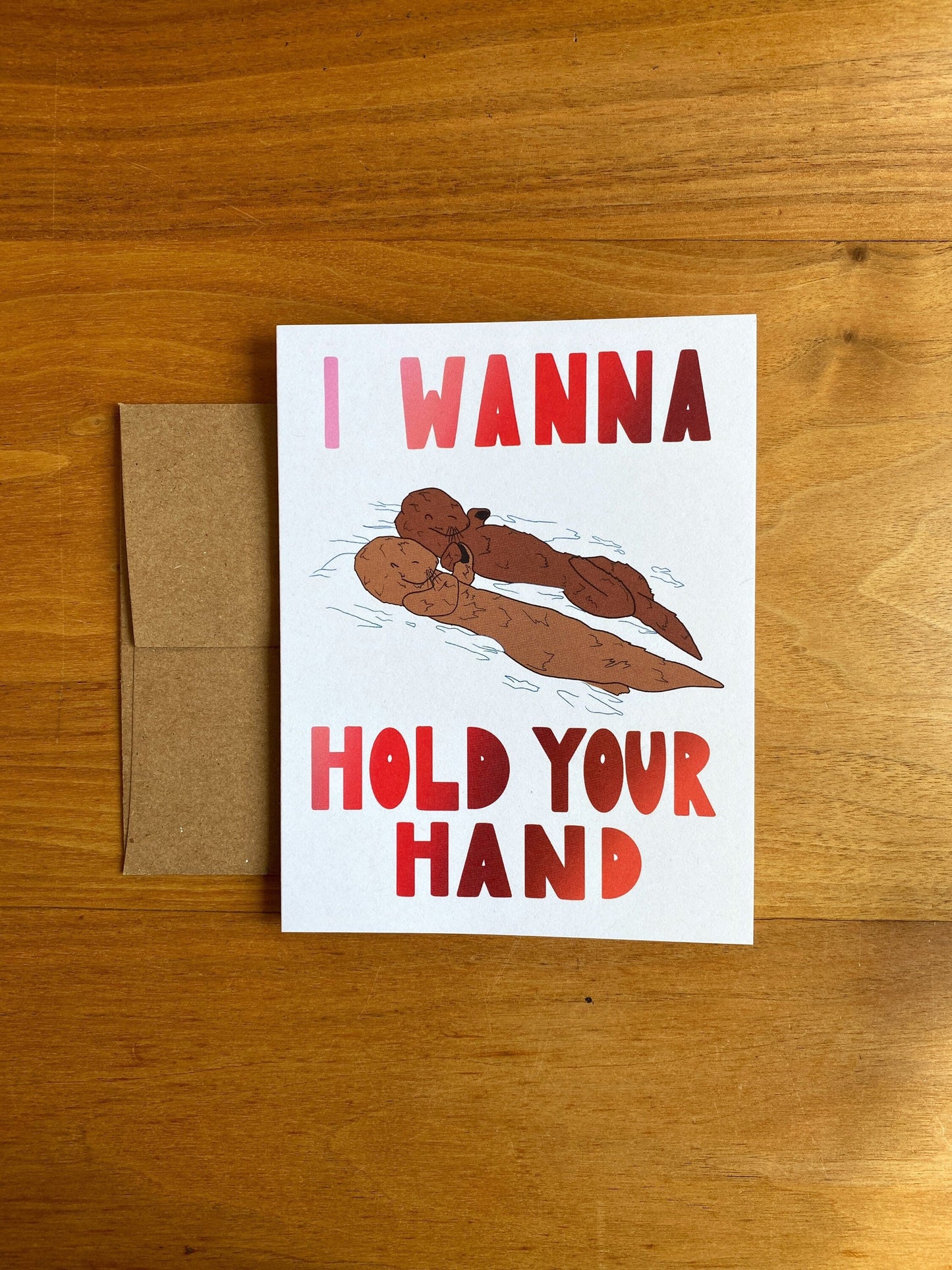 "I wanna hold your hand" otters holding hands card