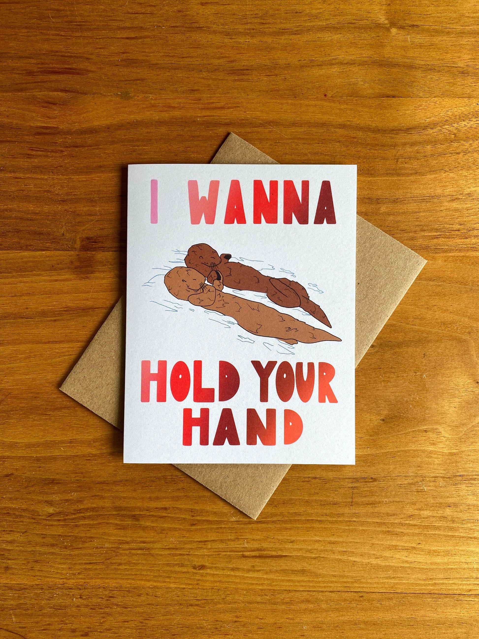 "I wanna hold your hand" otters holding hands card